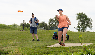 Family playing disc golf at Capital Springs 