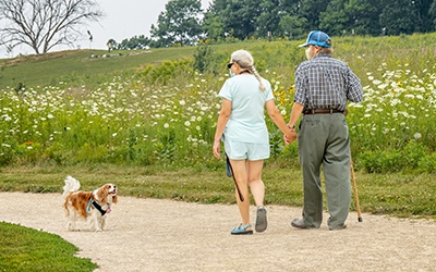 two people and dog at Capital Springs Recreation Area Dog Park