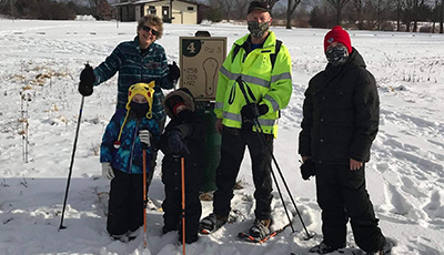 Family snowshoeing at Token Creek