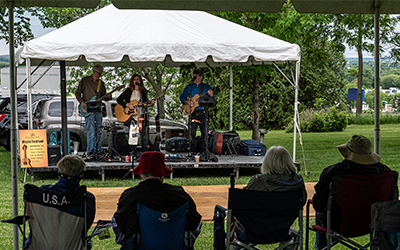 Musicians under a tent