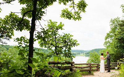 Couple at the overlook at Indian Lake with lake in background